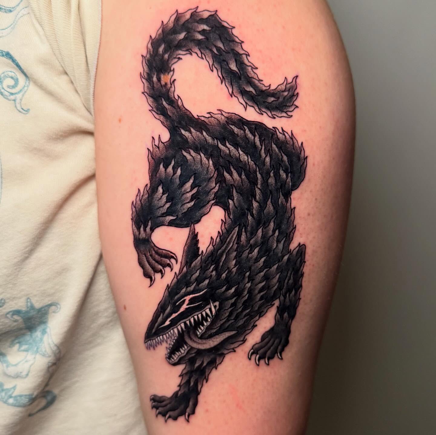 Dragon realism tattoo on the forearm by Zac Chaffin