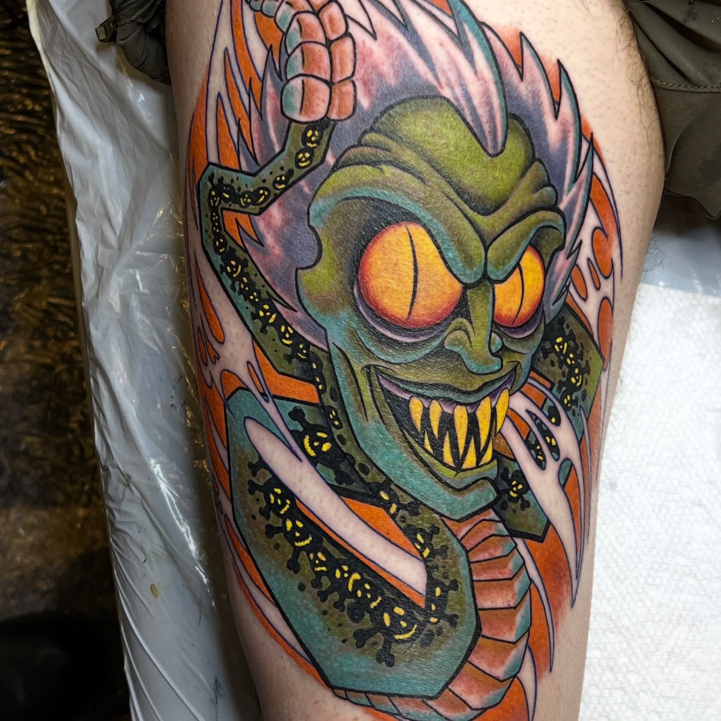 Alien creature American traditional tattoo on the thigh by Bobby Tobin