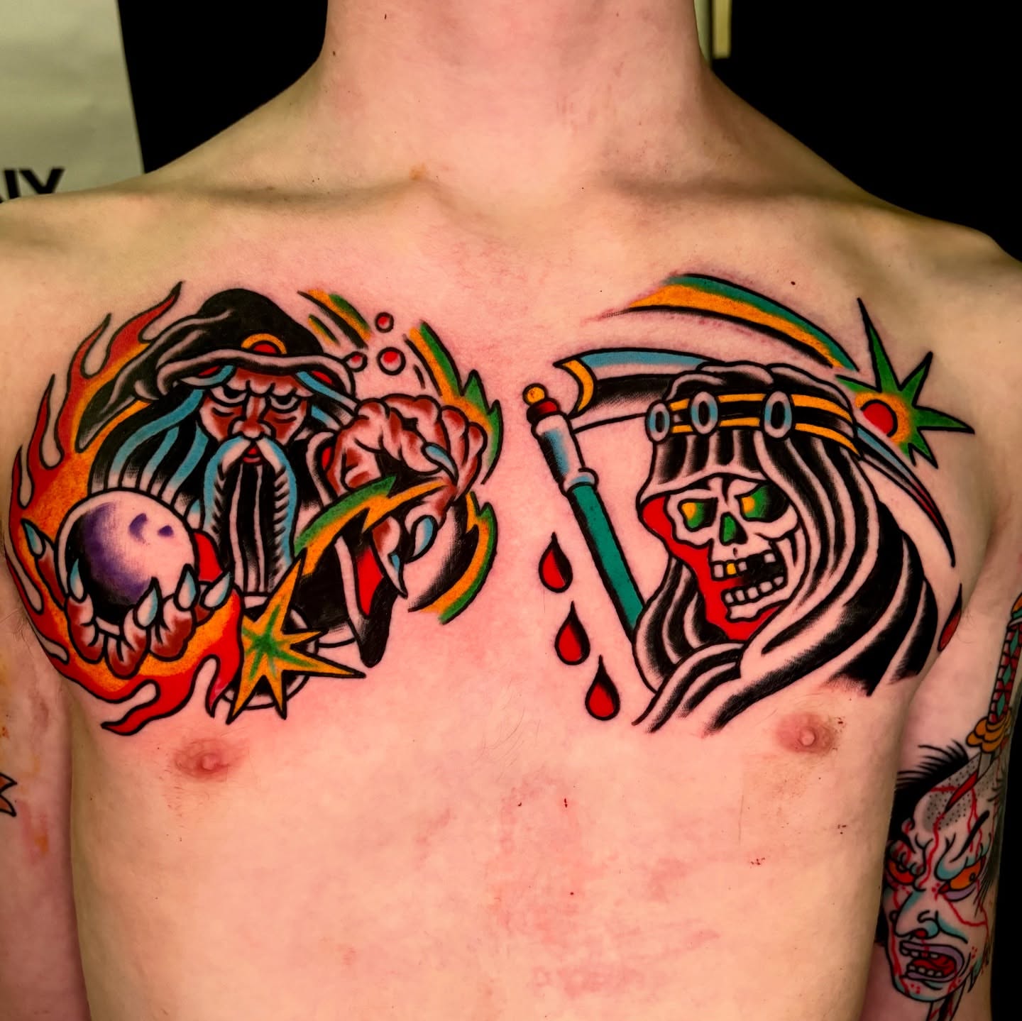 Skull and wizard American traditional tattoo on the chest by Santo Zelaya, San Francisco, California