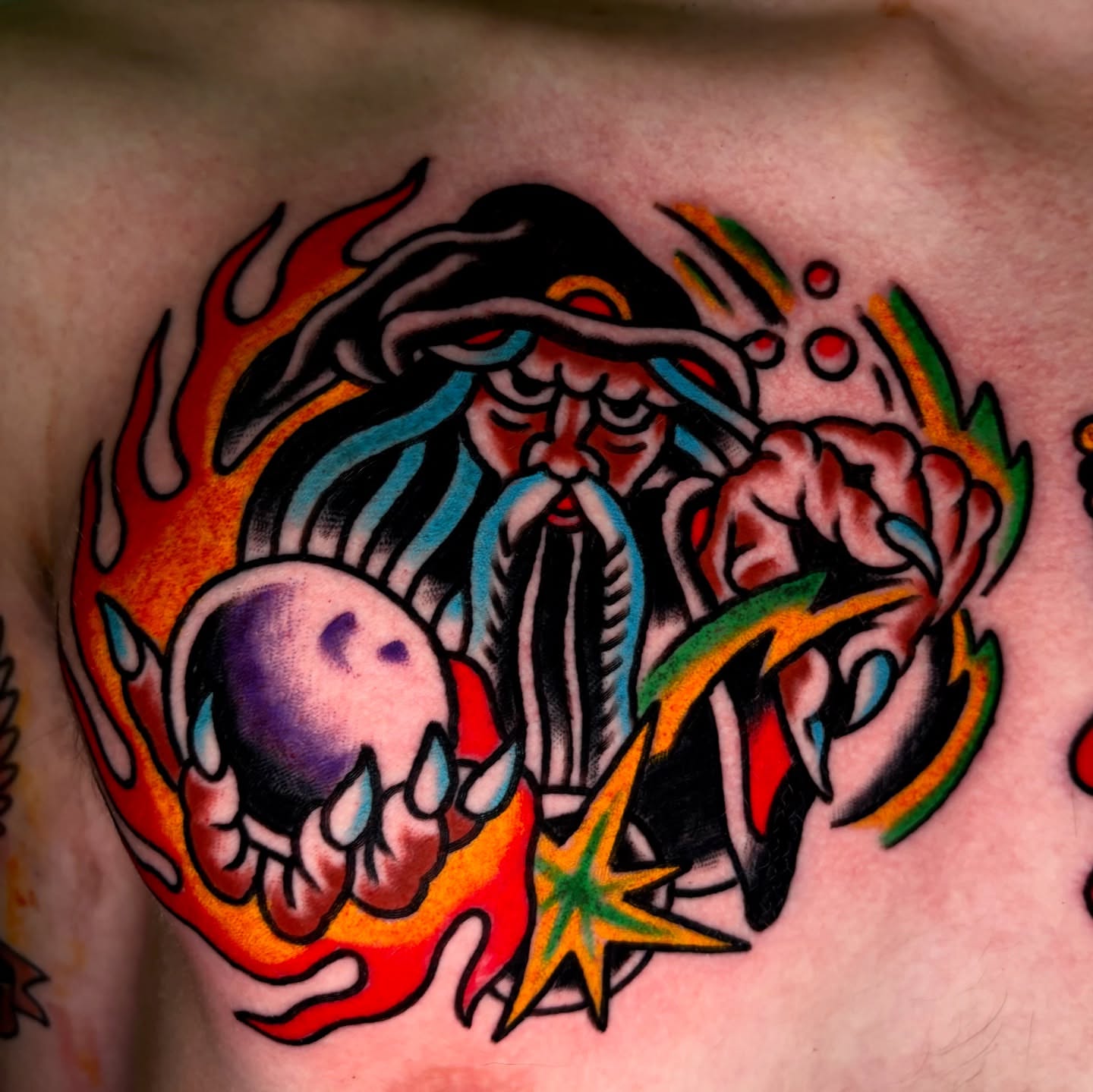 Wizard with skull American traditional tattoo on the chest by Santo Zelaya, San Francisco, California