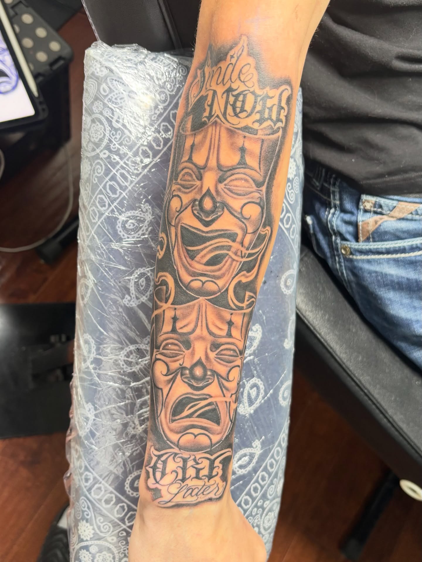 Mask American traditional tattoo on the forearm by @tattoosbyadrian