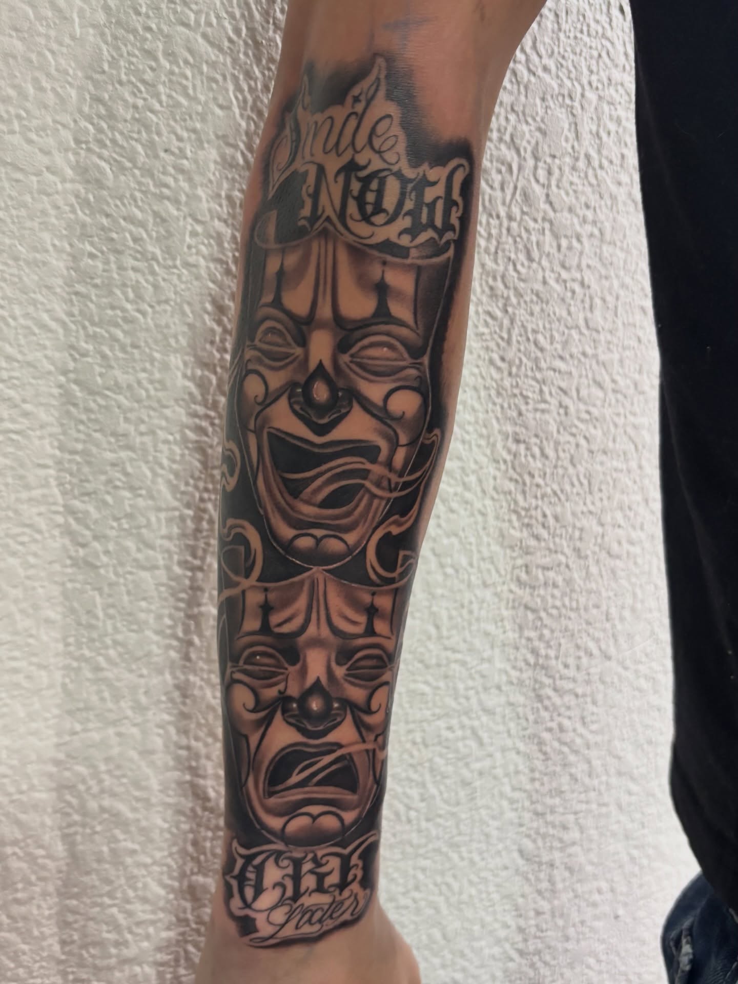 Mask geometric tattoo on the forearm by @tattoosbyadrian
