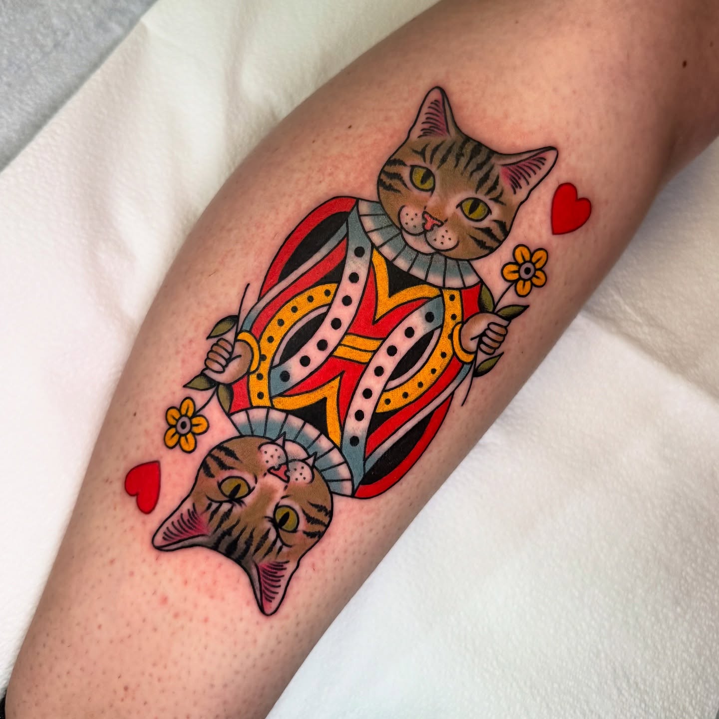 Cat American traditional tattoo on the forearm by Chelstine, Encinitas, California
