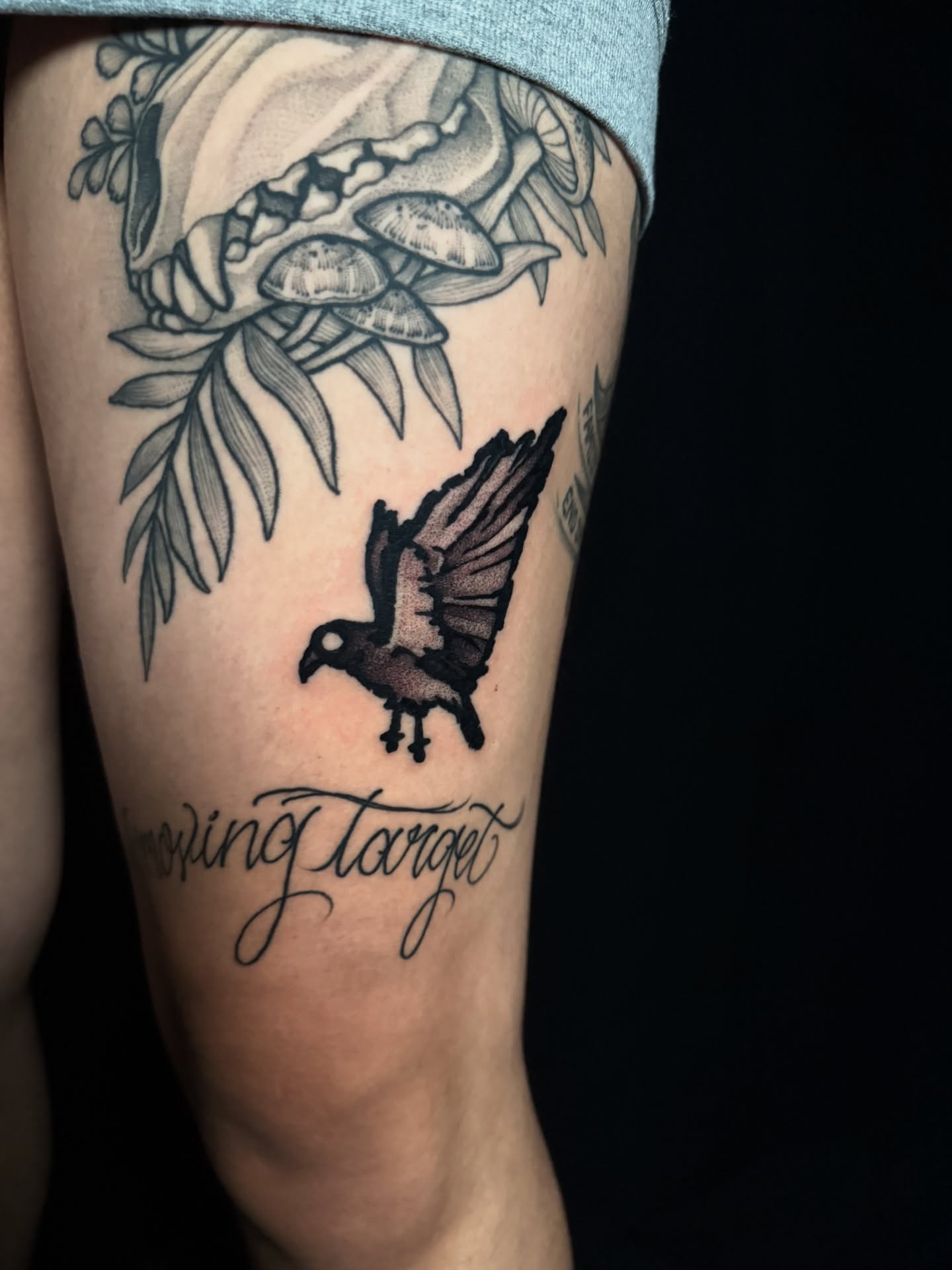 Crow black and grey tattoo on the thigh by z o y a, Seattle, Washington