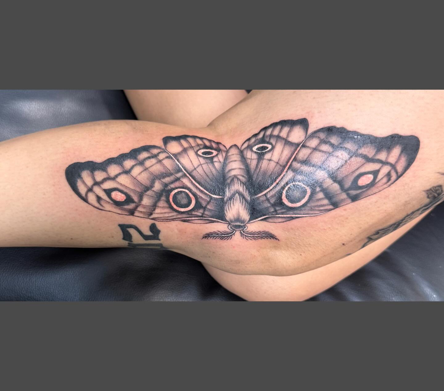 Butterfly realism tattoo on the thigh by Richard Nagy, New Orleans, Louisiana
