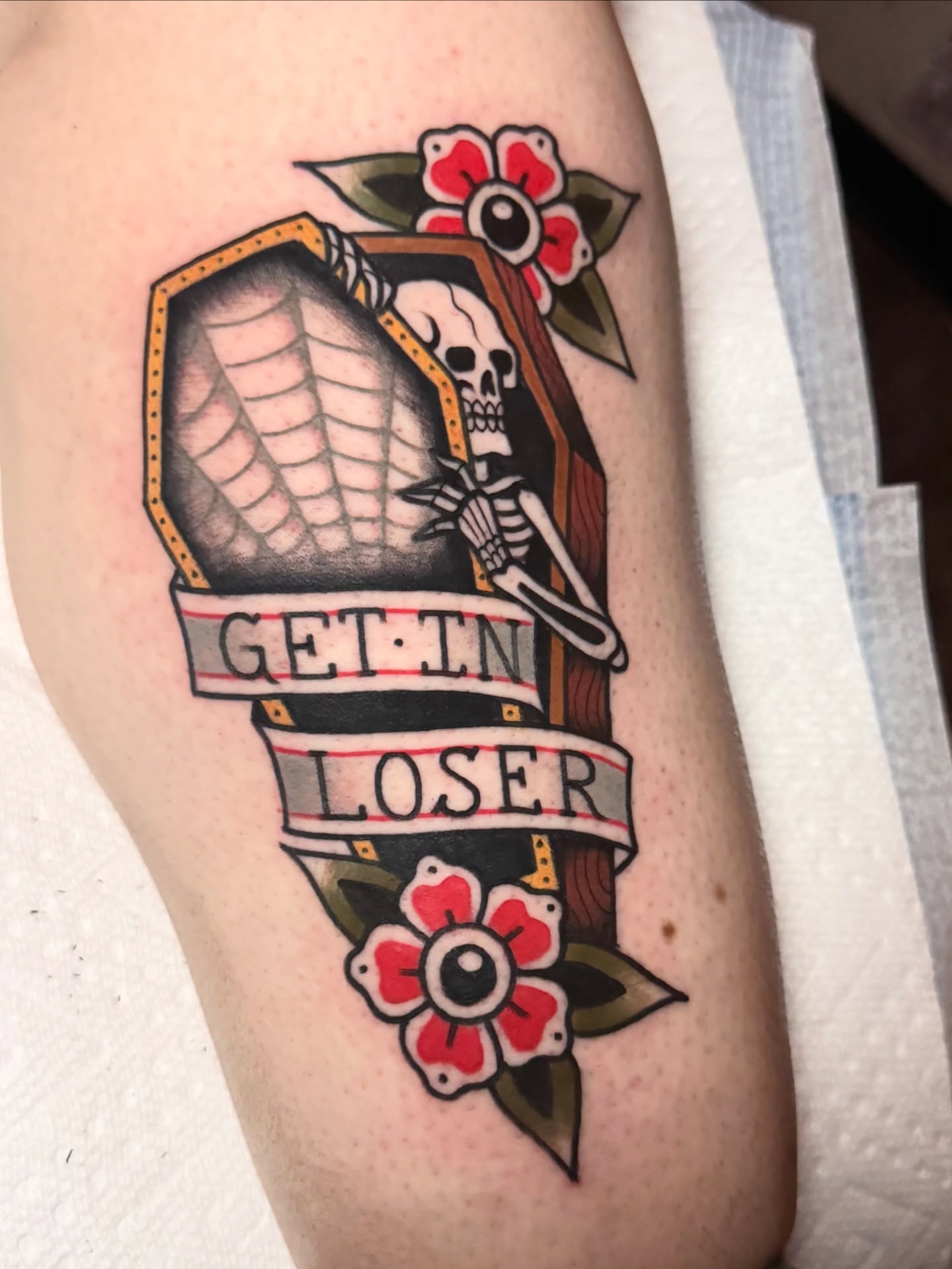Skeleton in coffin American traditional tattoo on the thigh by K y l e   M a c K e n z i e, Salem, Massachusetts