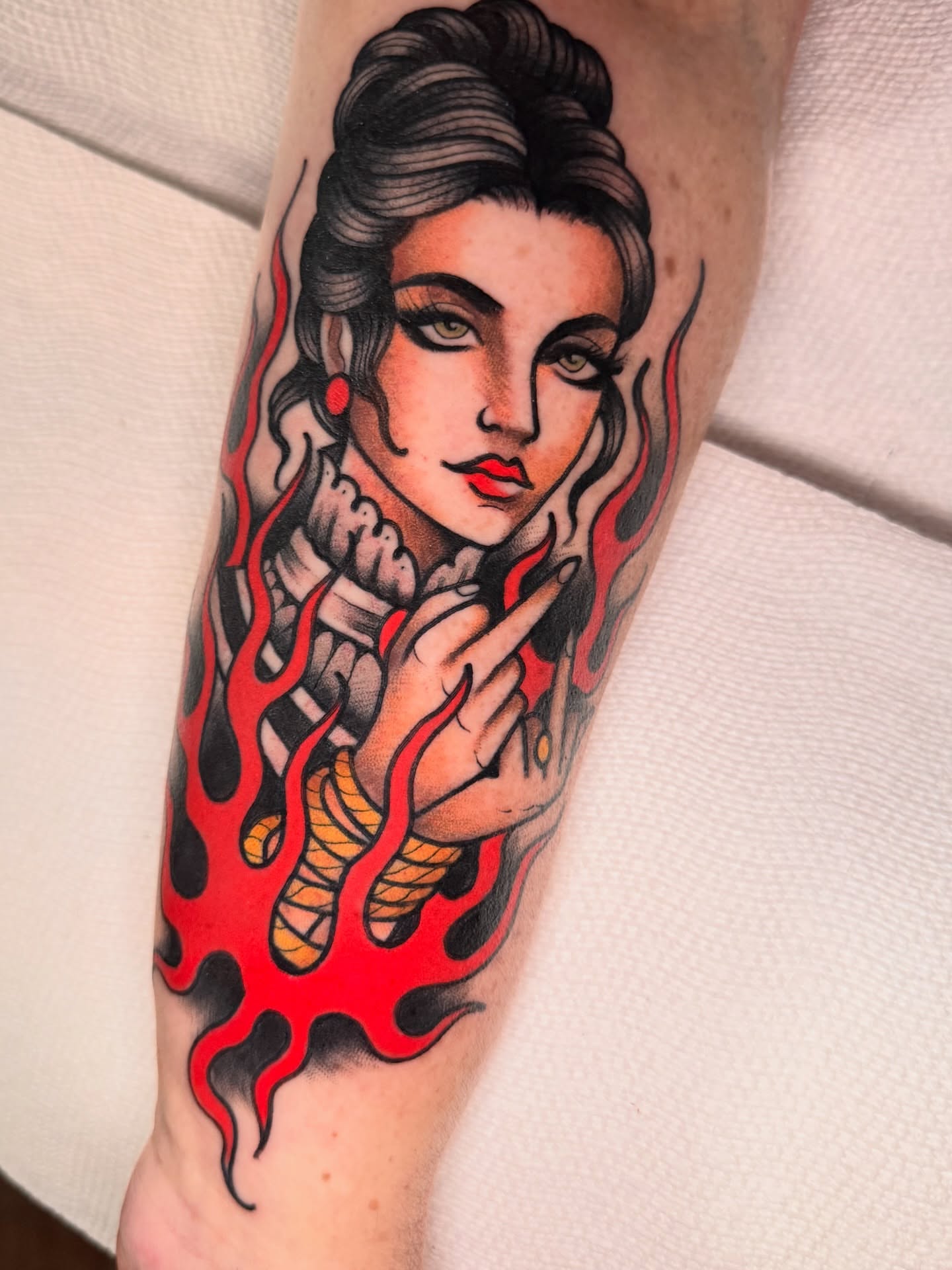 Woman with flames American traditional tattoo on the forearm by K y l e   M a c K e n z i e, Salem, Massachusetts