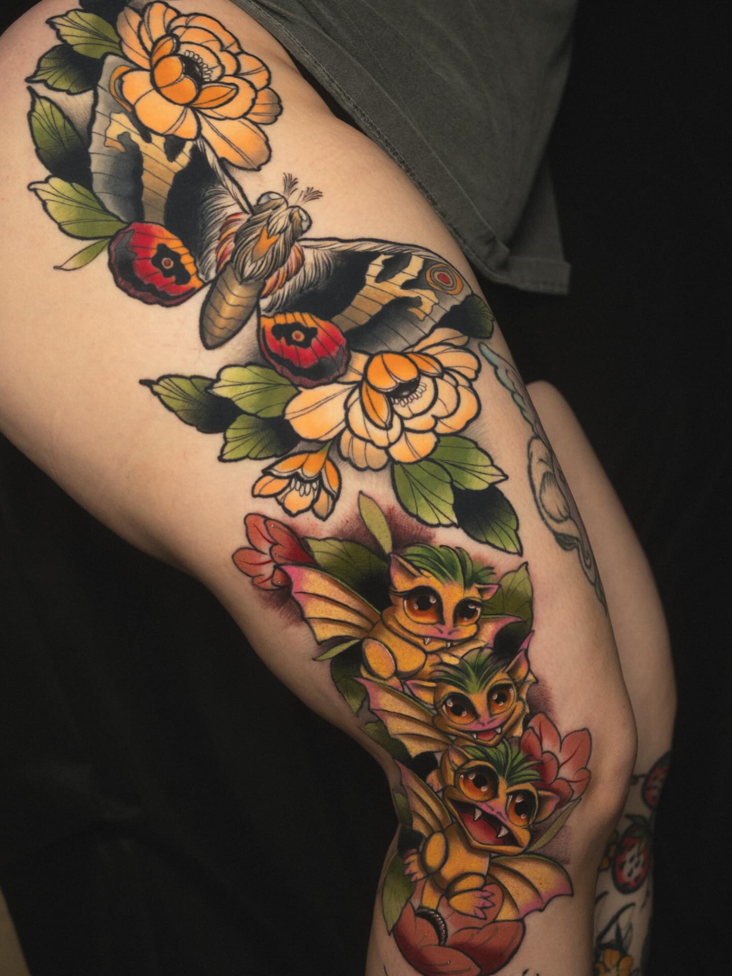 Bats and flowers American traditional tattoo on the thigh by Robert Graye