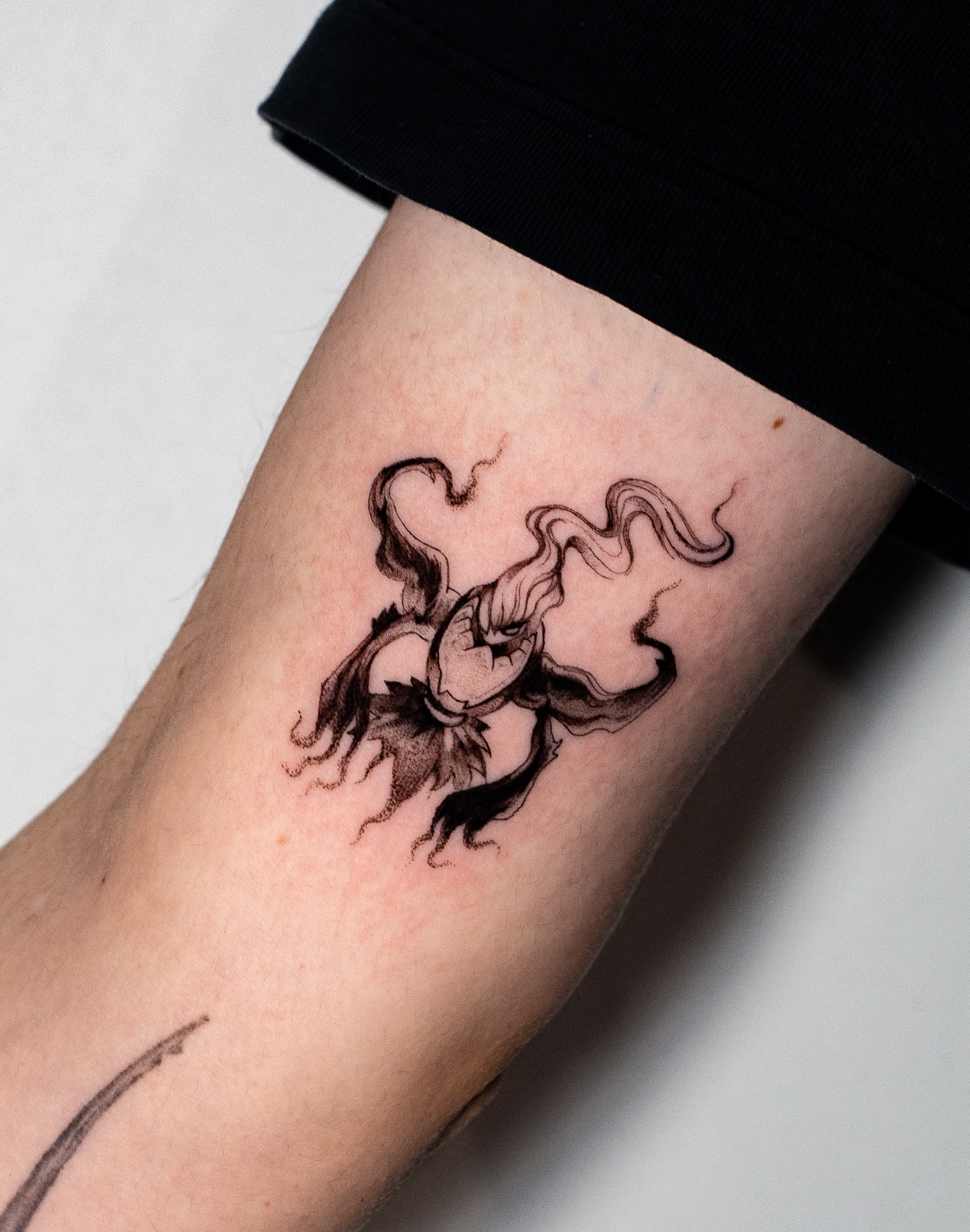 Octopus black and grey tattoo on the forearm by Kalin, Seattle, Washington