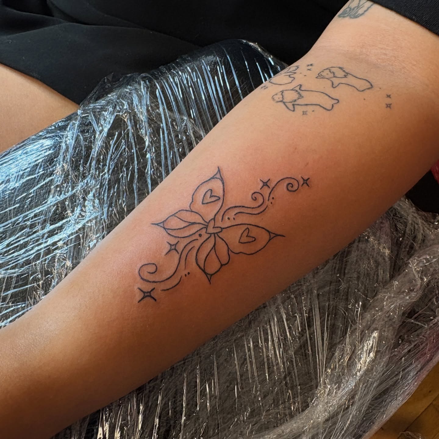 Butterfly fine line tattoo on the forearm by Emma🌸✨Austin Tattoo Artist