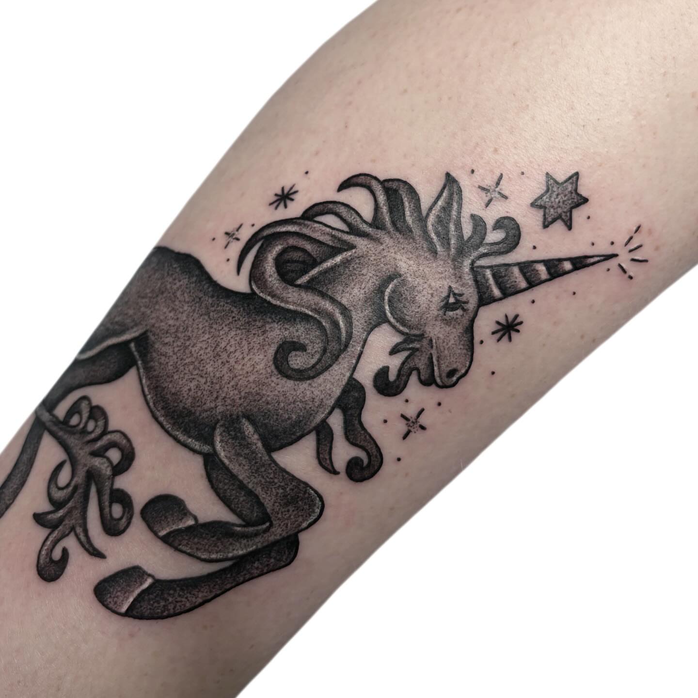 Unicorn dotwork tattoo on the forearm by Ava Brady Tattoos