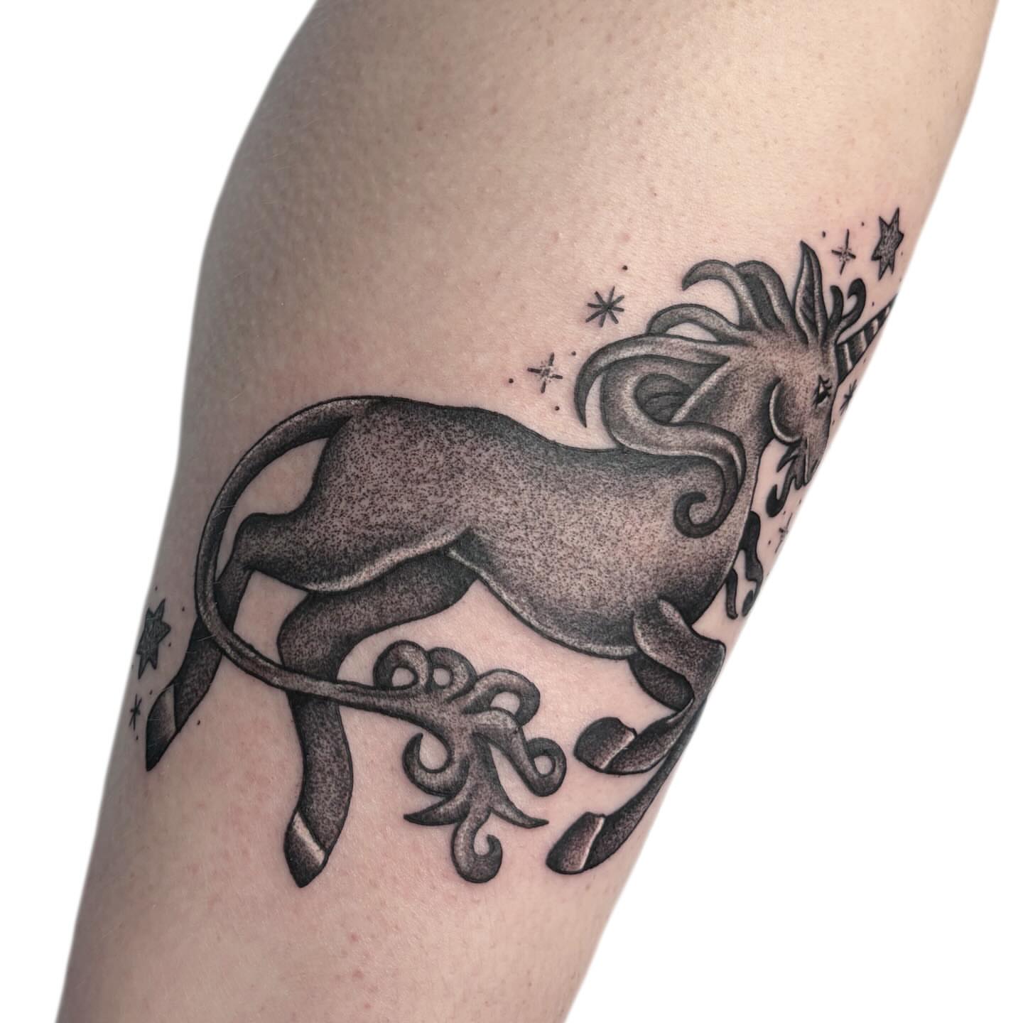 Unicorn black and grey tattoo on the forearm by Ava Brady Tattoos