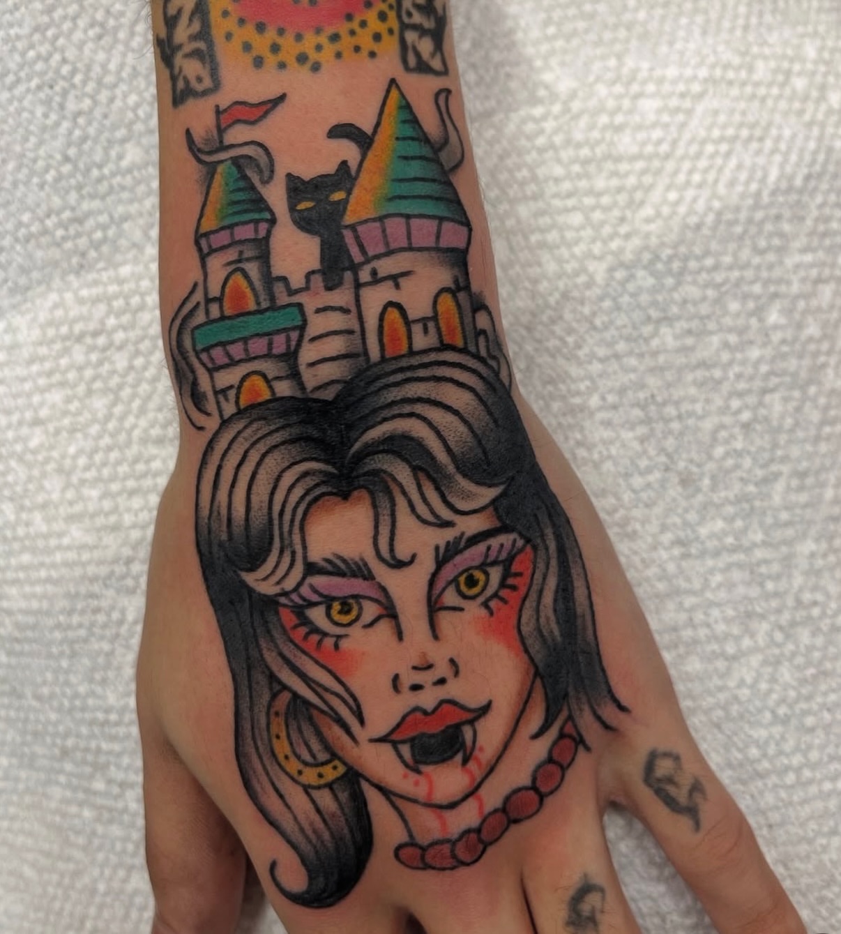 Woman's face American traditional tattoo on the hand by c☮︎urt