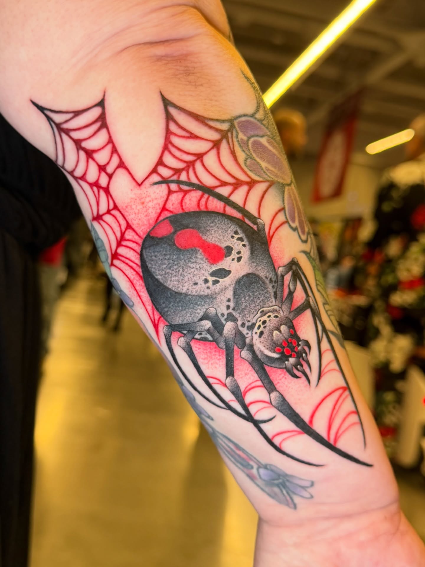 Spider American traditional tattoo on the forearm by Sam Castro