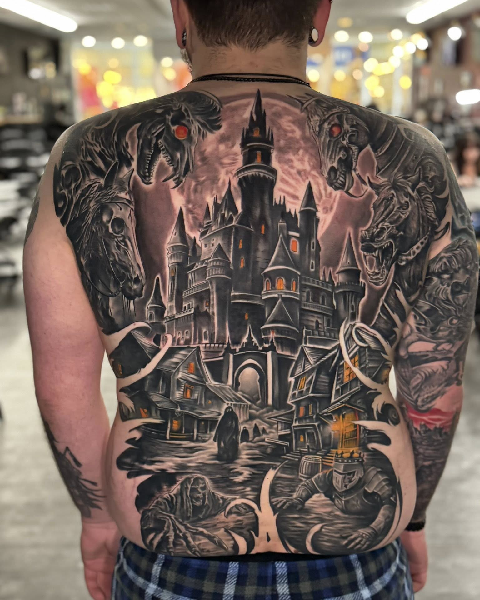 Tattoo by @shawnskaletattoos — dark_realism, black_and_grey