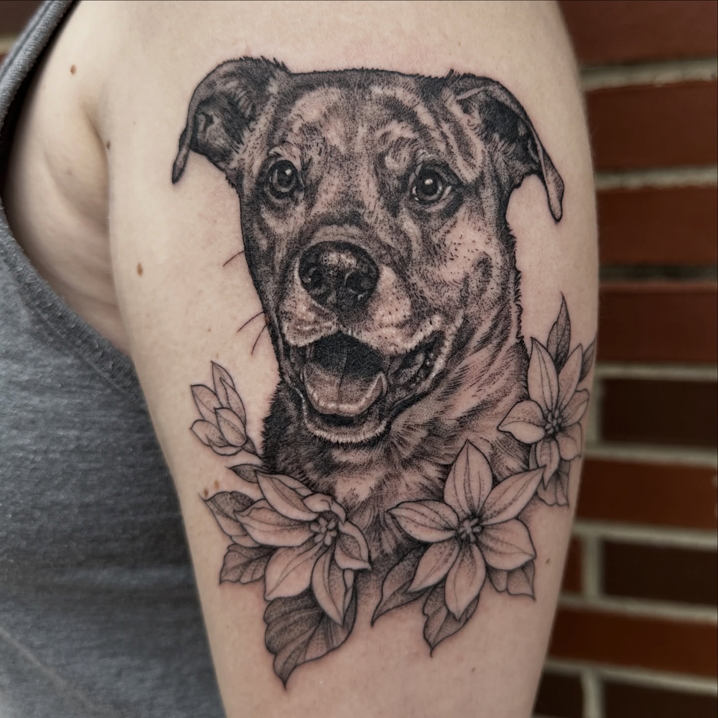 Dog portrait dotwork tattoo on the forearm by Robert McCollum