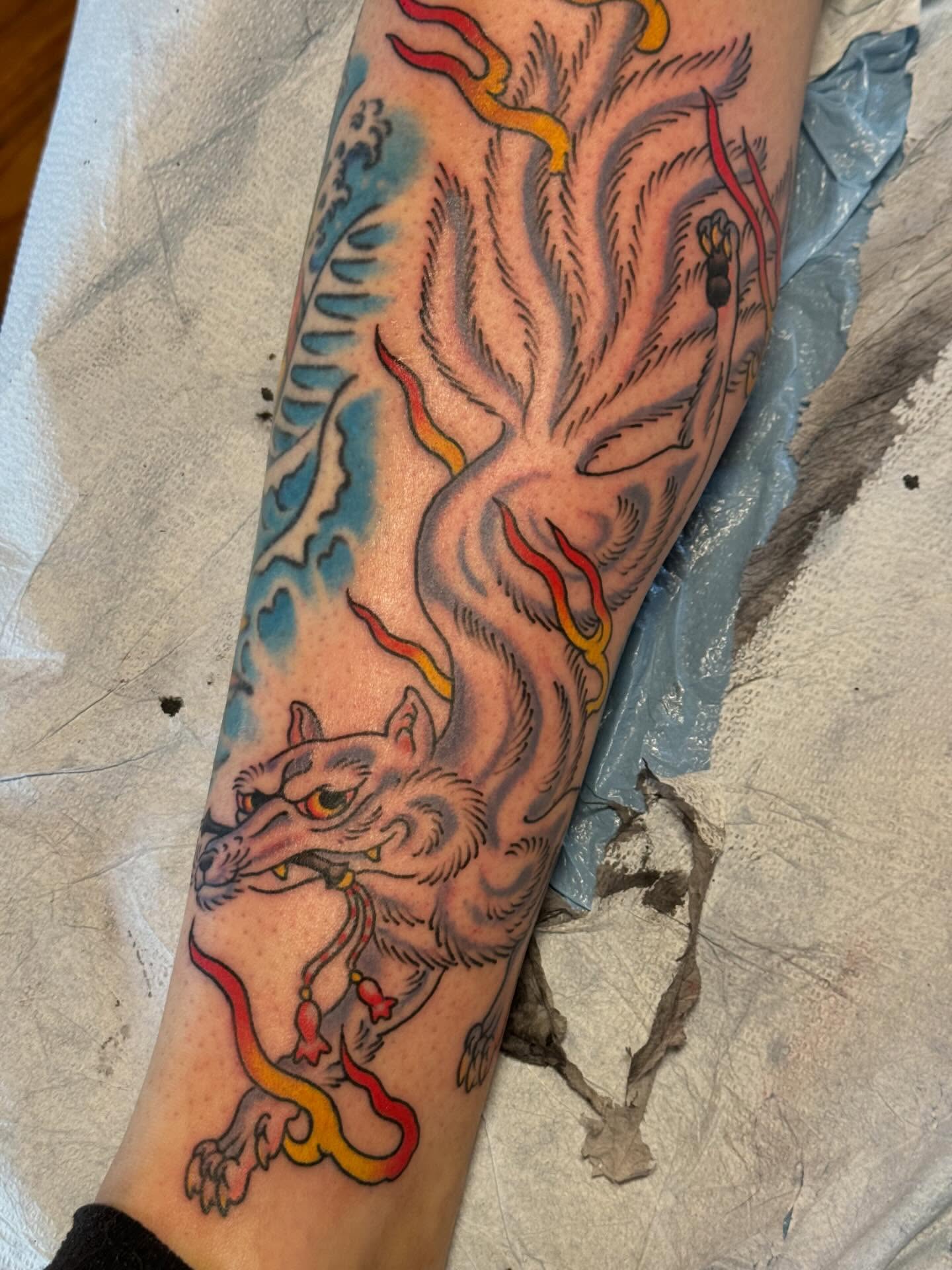 Nine-tailed fox japanese irezumi tattoo on the forearm by B