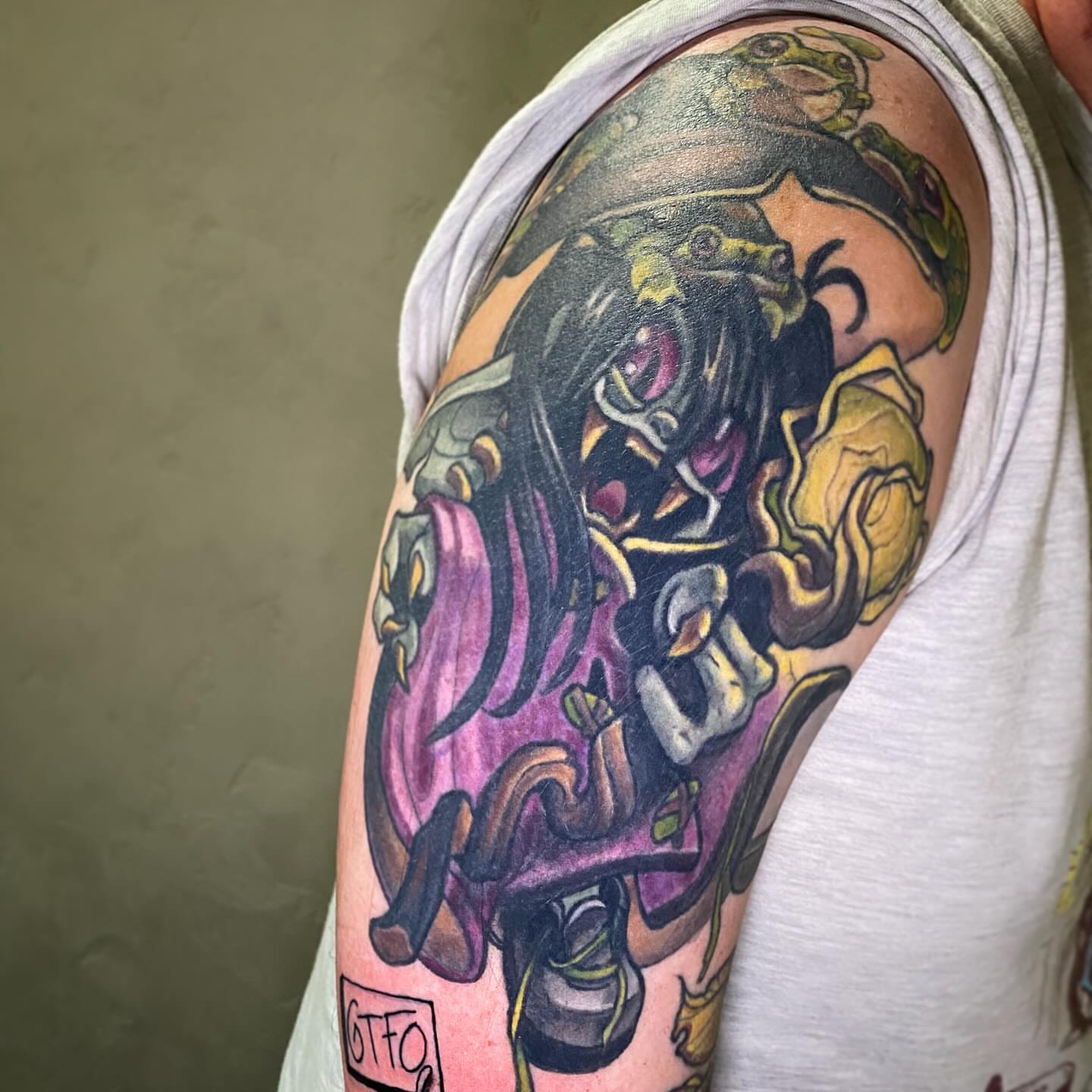Frog and roses new school tattoo on the shoulder by Lindsay Hall