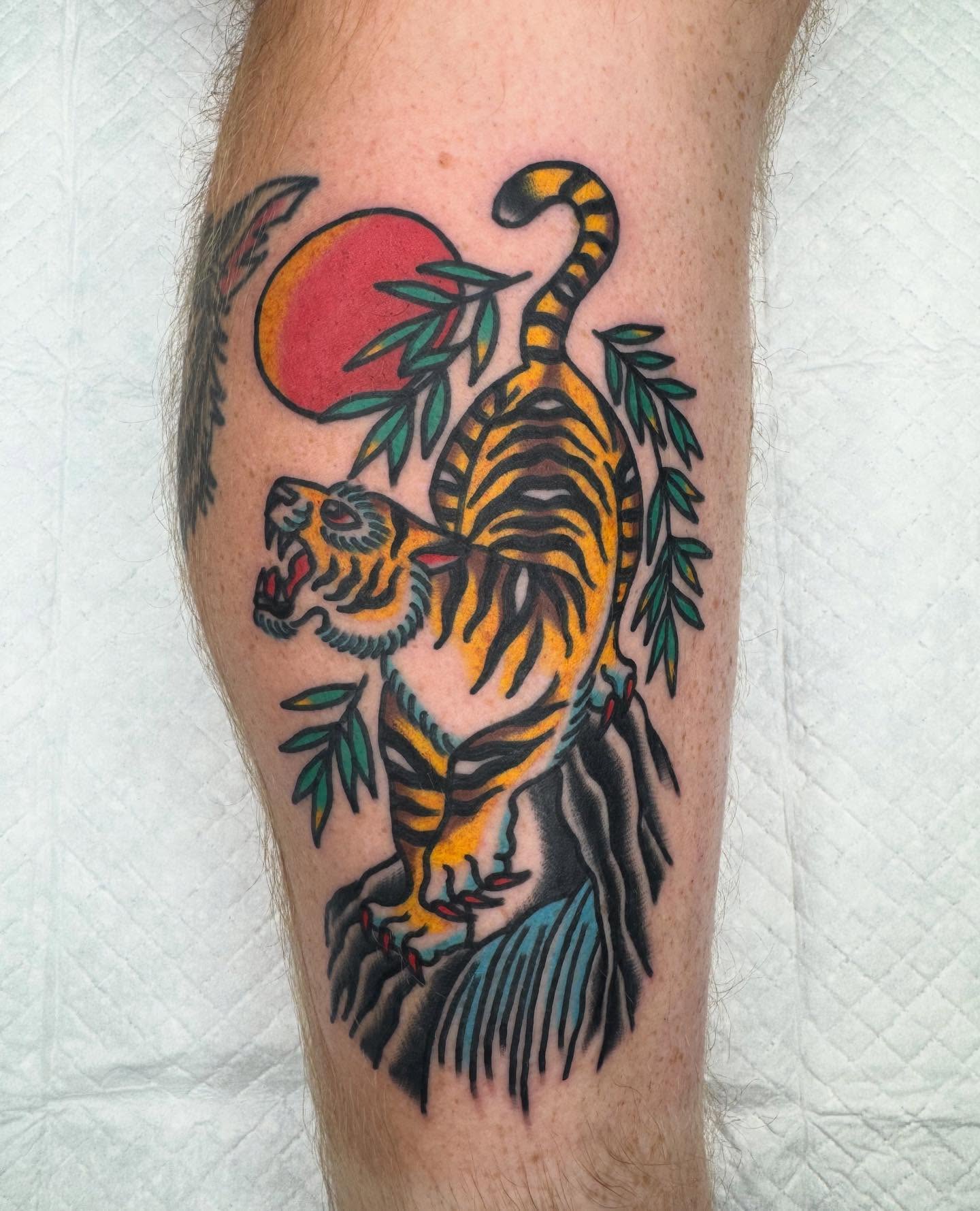 Tiger American traditional tattoo on the forearm by Oldschool Tattooer