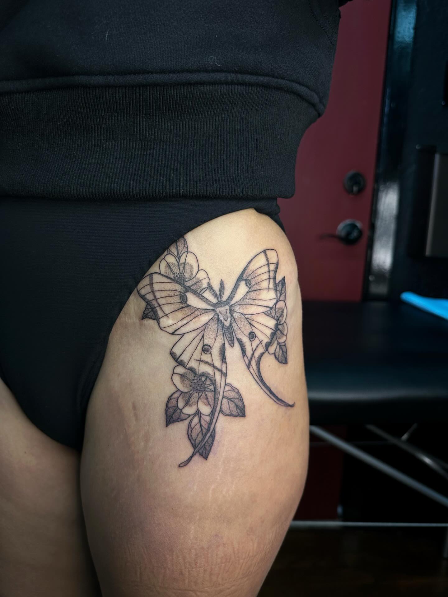 Butterfly black and grey tattoo on the thigh by J Valentin