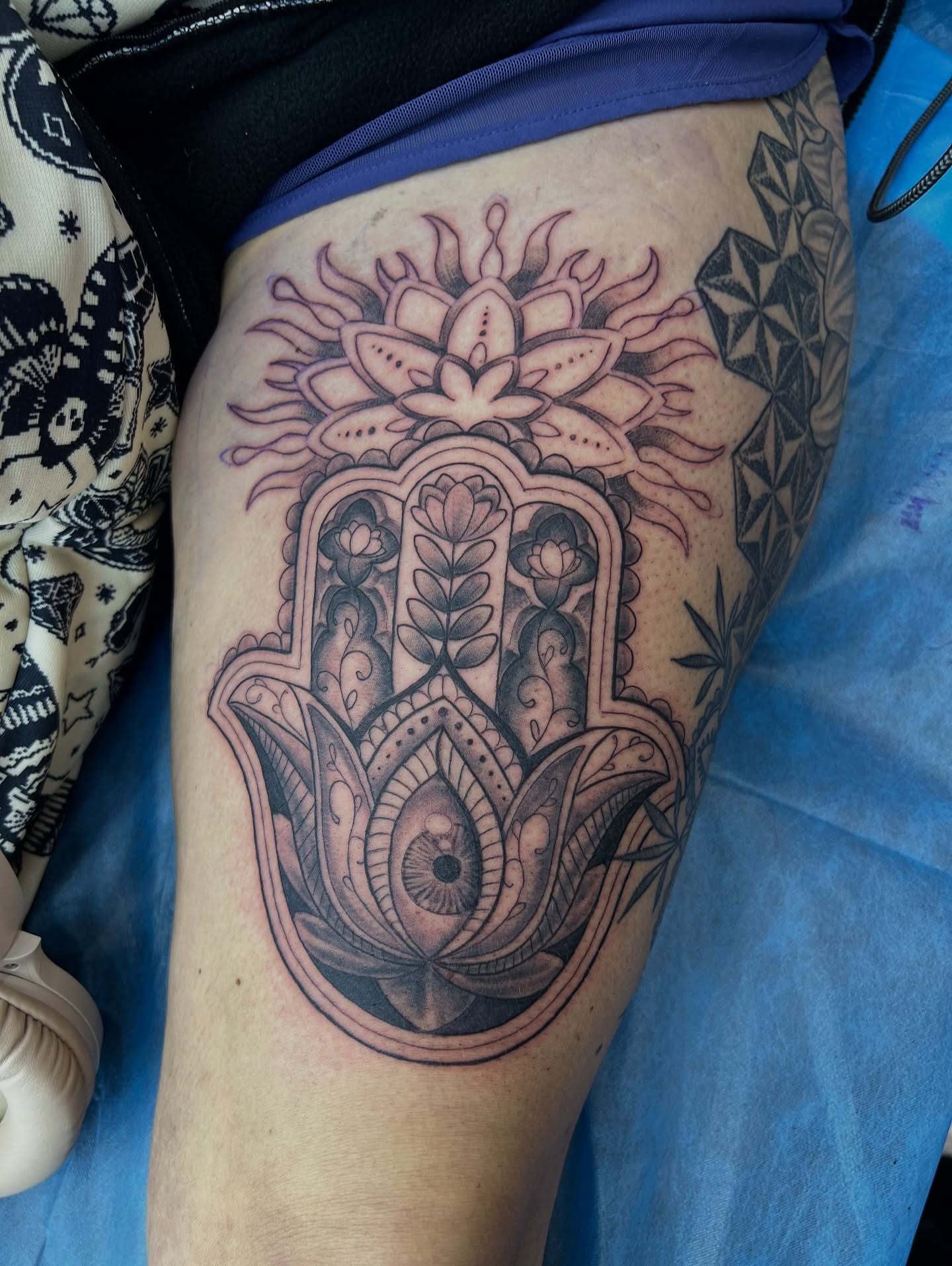 Hamsa hand ornamental tattoo on the thigh by Steve Peace Calgary based tattoo artist, Calgary, Alberta