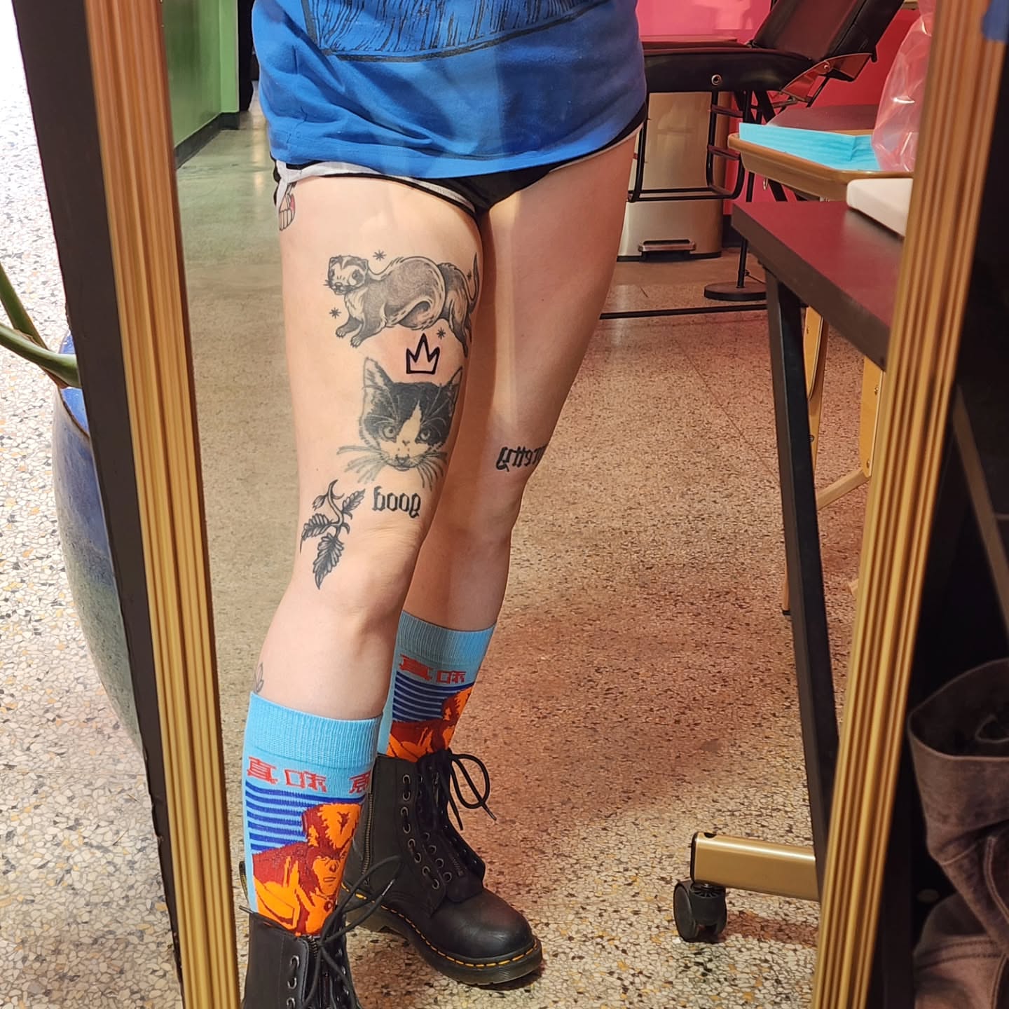 Cat and bird American traditional tattoo on the leg by K.F. Golden