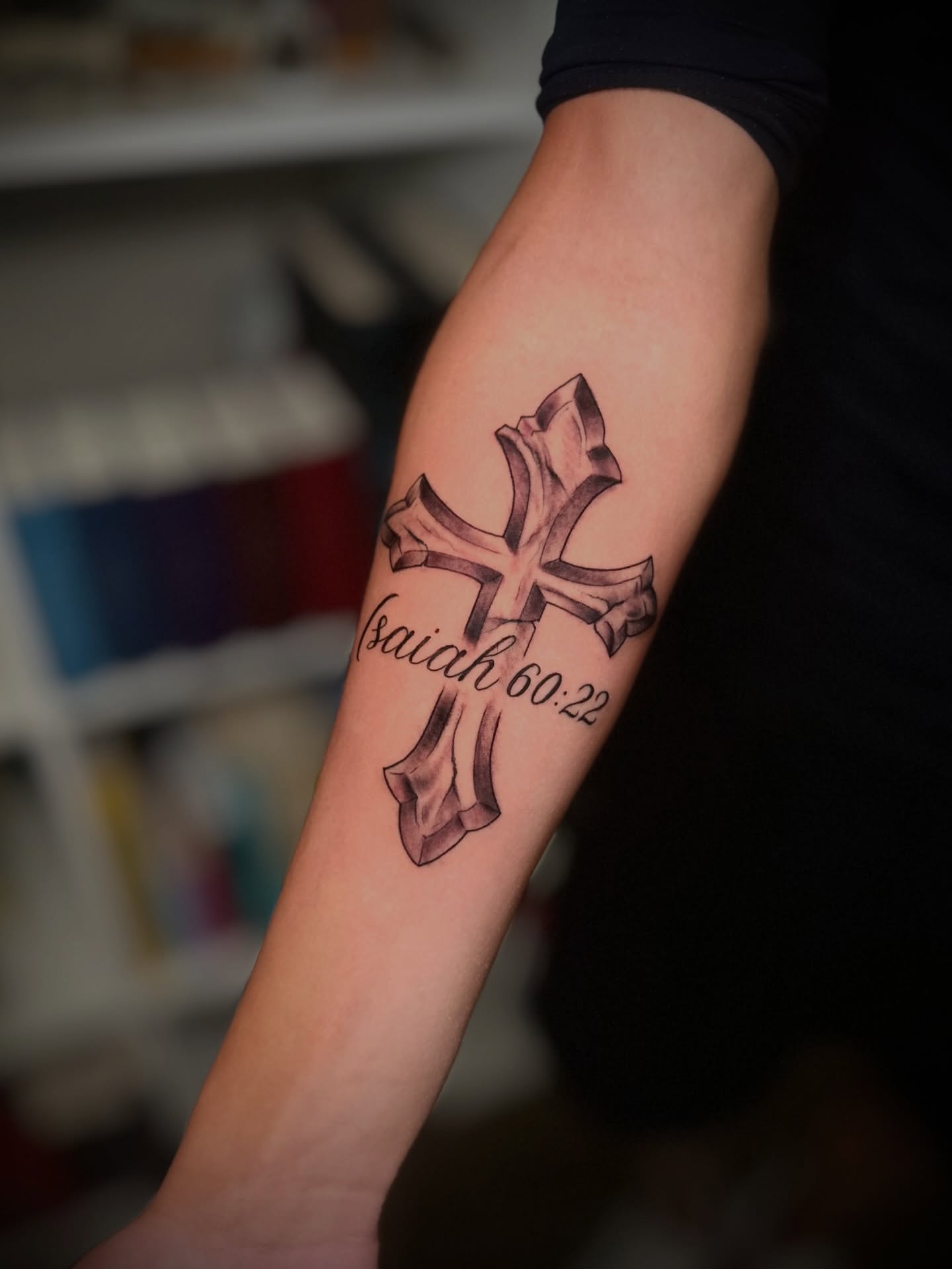 Cross black and grey tattoo on the forearm by @tatt2st