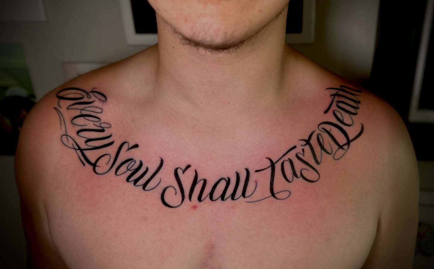 Every Soul Shall Taste Death lettering script tattoo on the chest by @tatt2st