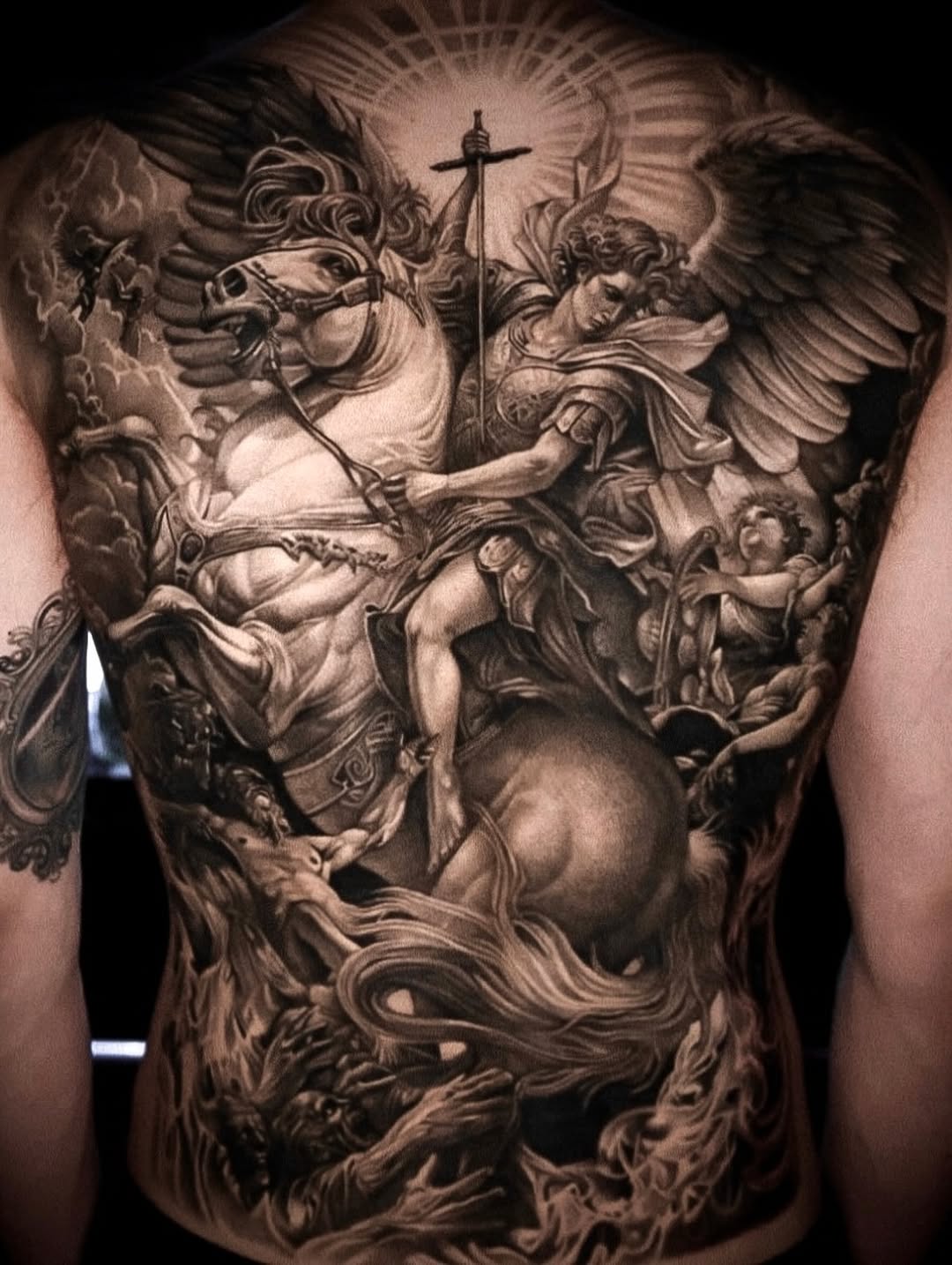 Archangel Michael on horseback realism tattoo on the back by D A N N y L I N