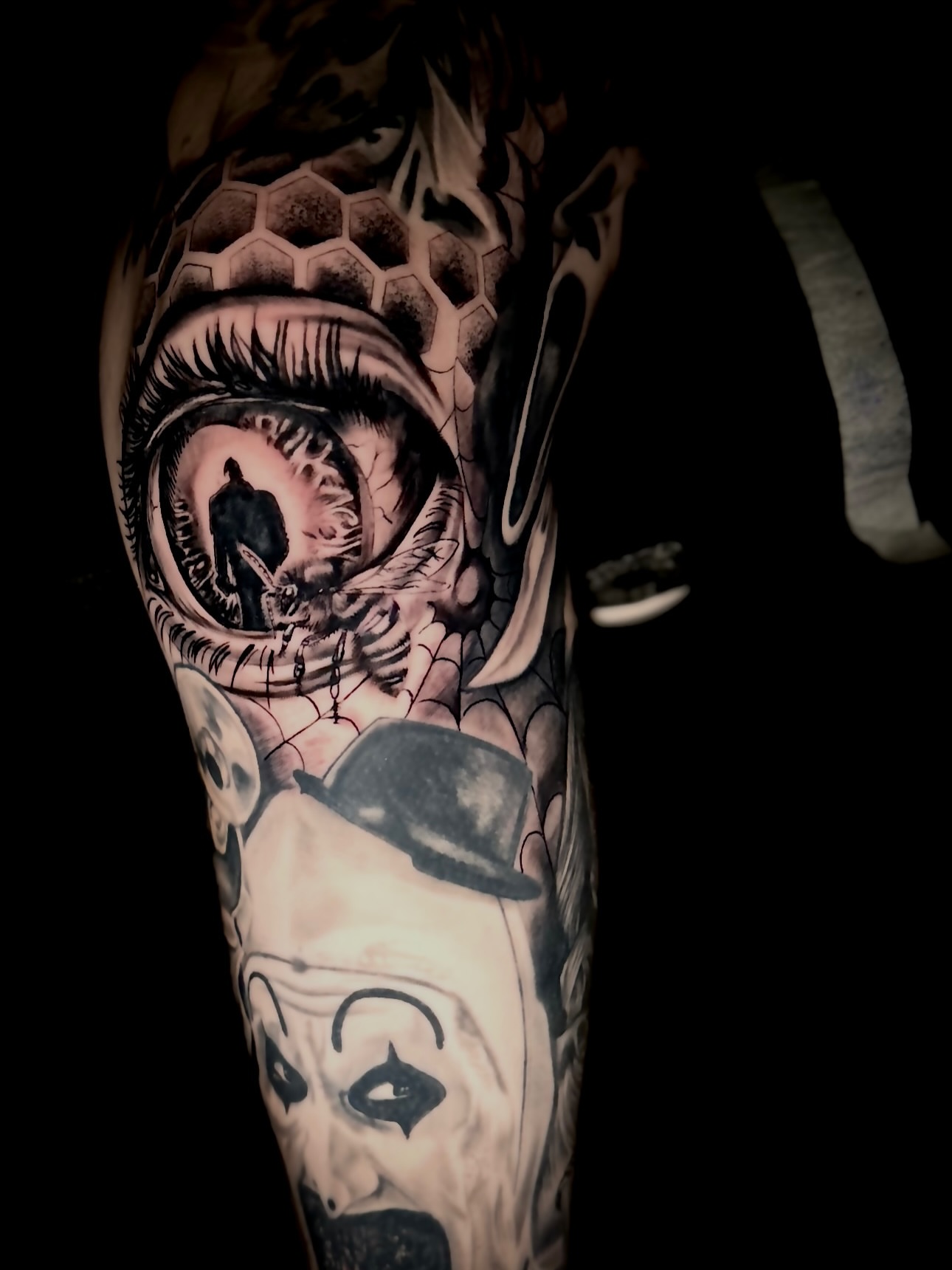 Clown face realism tattoo on the forearm by Tampa tattoo artist