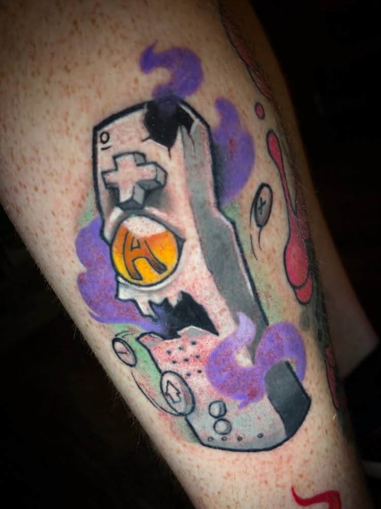 Video game controller new school tattoo on the forearm by Eathan Hale-(East TN) Newschool Tattoo Artist