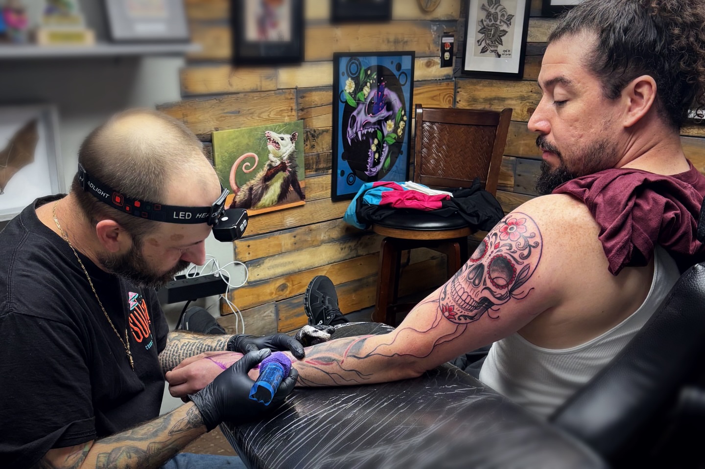 Sugar skull American traditional tattoo on the upper arm by Ben Cecil, Summerville, South Carolina