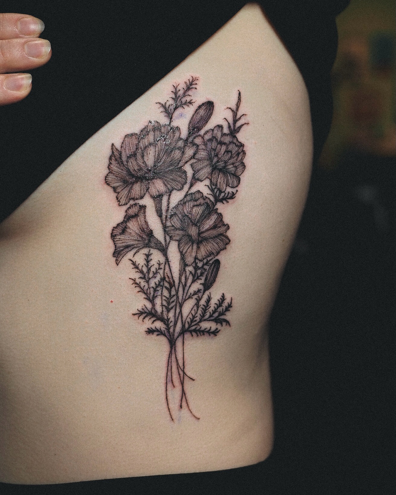 Flowers black and grey tattoo on the ribs by Inks by Nastia
