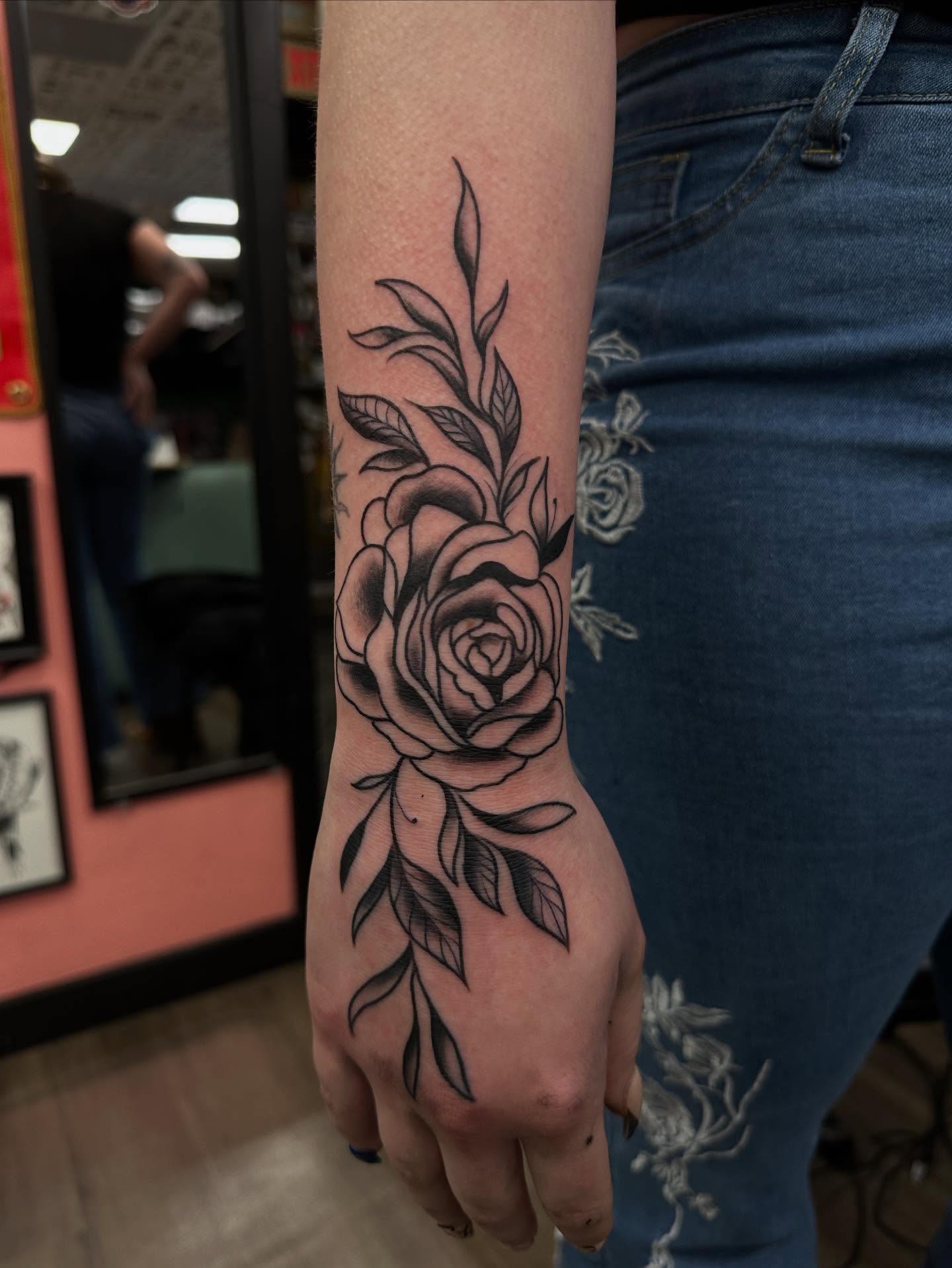 Rose black and grey tattoo on the hand by Columbus tattoo artist