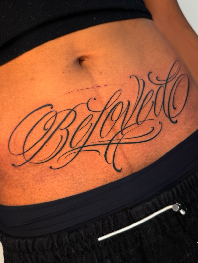 Script lettering lettering script tattoo on the torso by Chicanocustomlettering