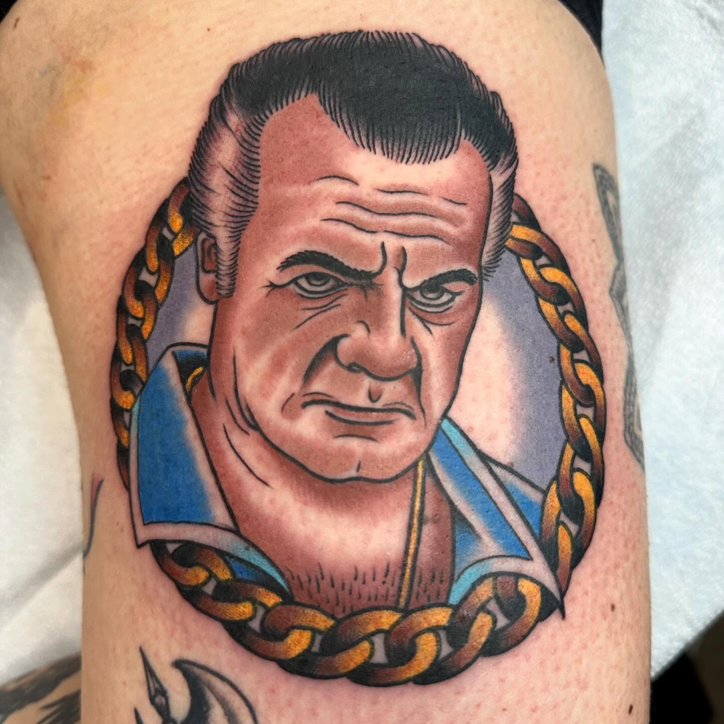 Portrait of a man American traditional tattoo on the thigh by Tony Medellin 7X9X