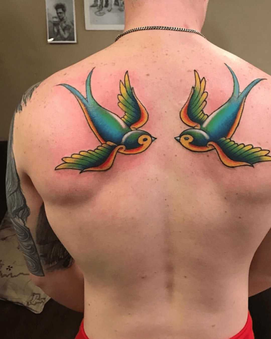 Swallows American traditional tattoo on the back by Gabriel Torres