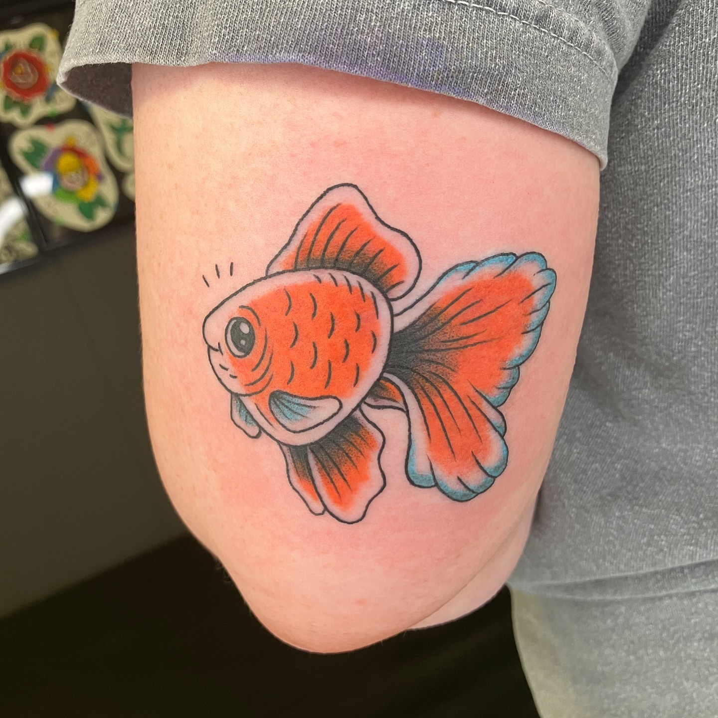 Goldfish American traditional tattoo on the thigh by maddie mcghee, Memphis, Tennessee