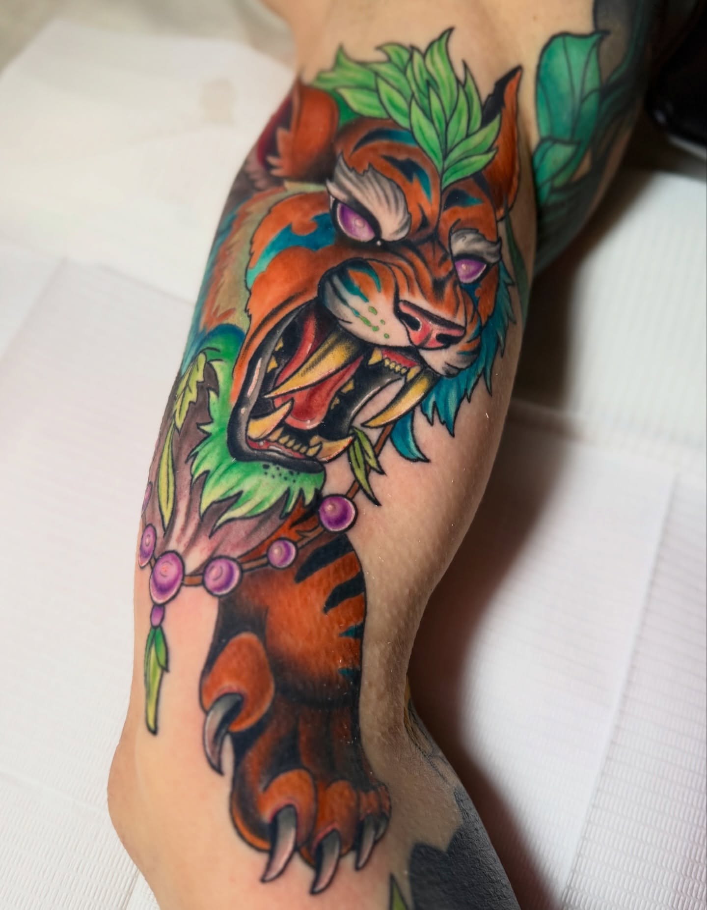 Tiger new school tattoo on the forearm by Tattoos By Lola Cavotta, Willoughby, Ohio