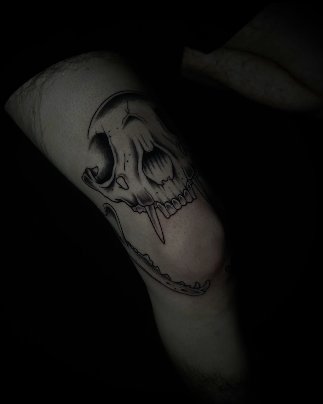 Skull black and grey tattoo on the forearm by Heaven Arianna
