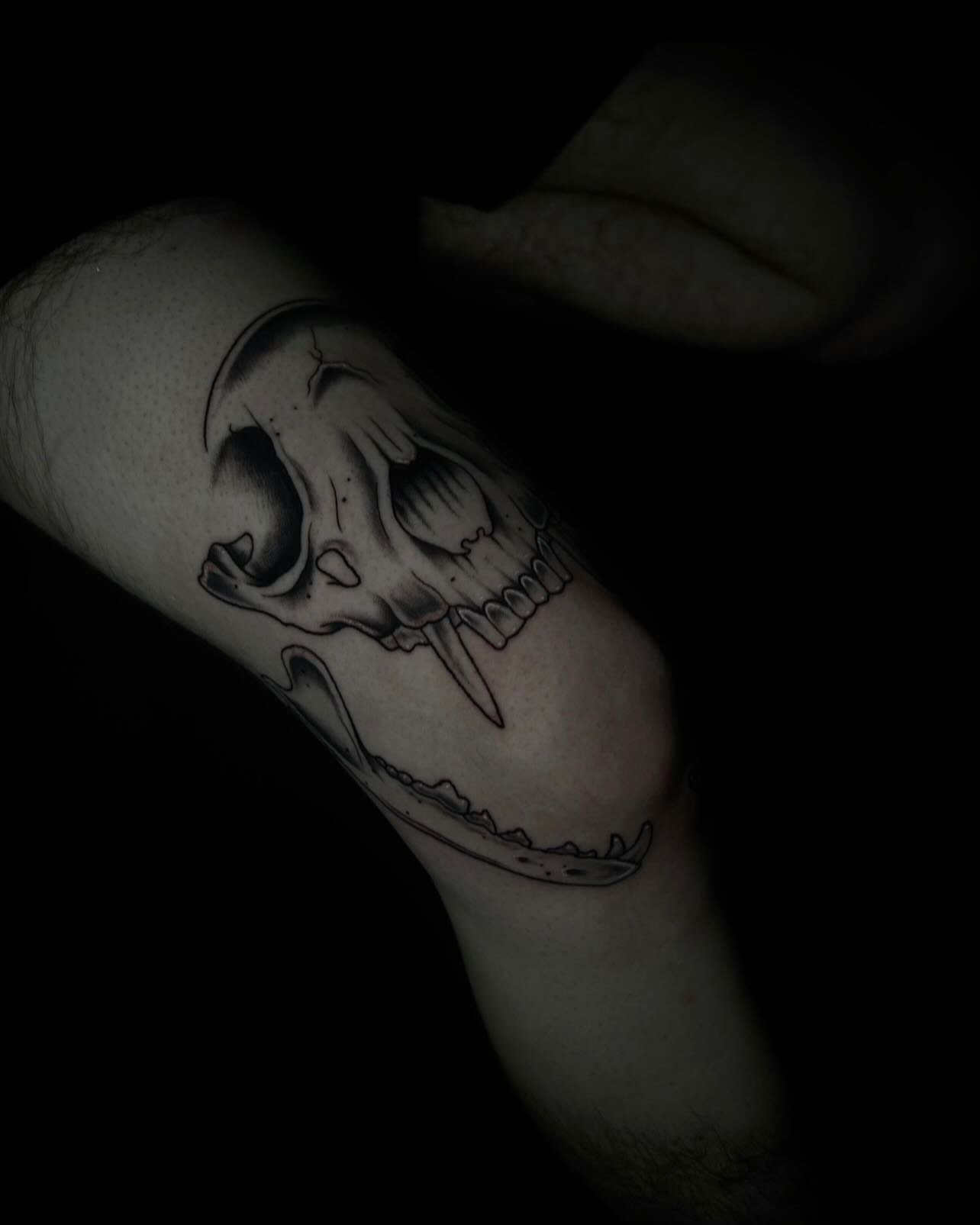 Skull black and grey tattoo on the forearm by Heaven Arianna