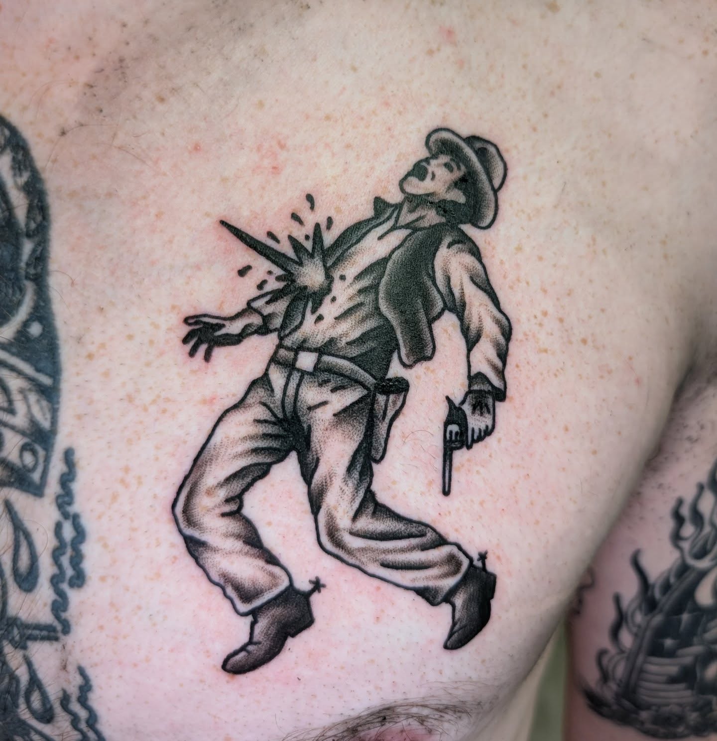Cowboy black and grey tattoo on the chest by Erik O'Steen, Medford, Massachusetts