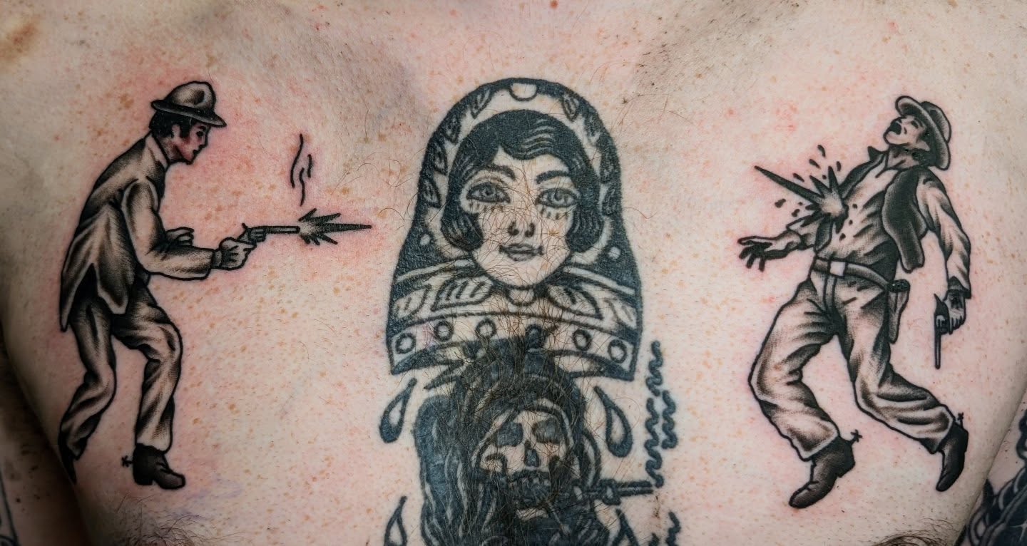 Woman with skull American traditional tattoo on the chest by Erik O'Steen, Medford, Massachusetts