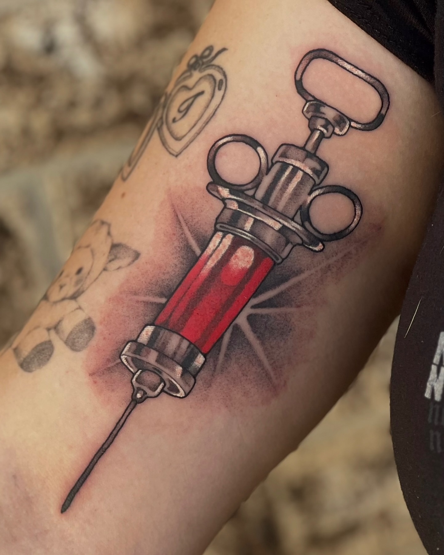Syringe realism tattoo on the forearm by ty ☆ nbtx tattoo artist