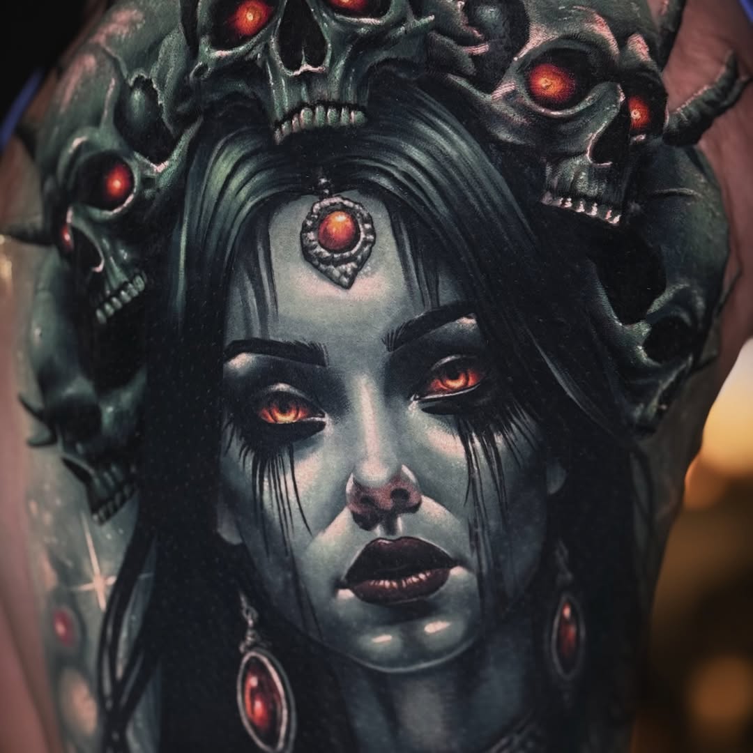 Woman with skulls realism tattoo on the forearm by Bailey Hancock