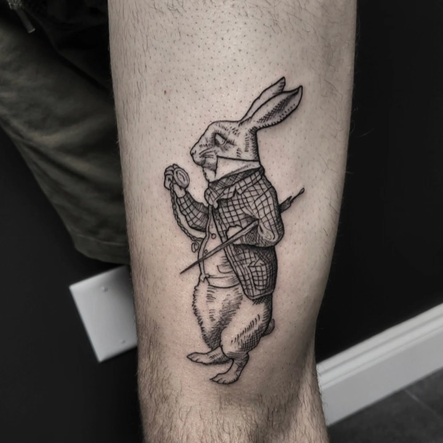 Rabbit black and grey tattoo on the forearm by Kyle Joseph [tattoo artist]