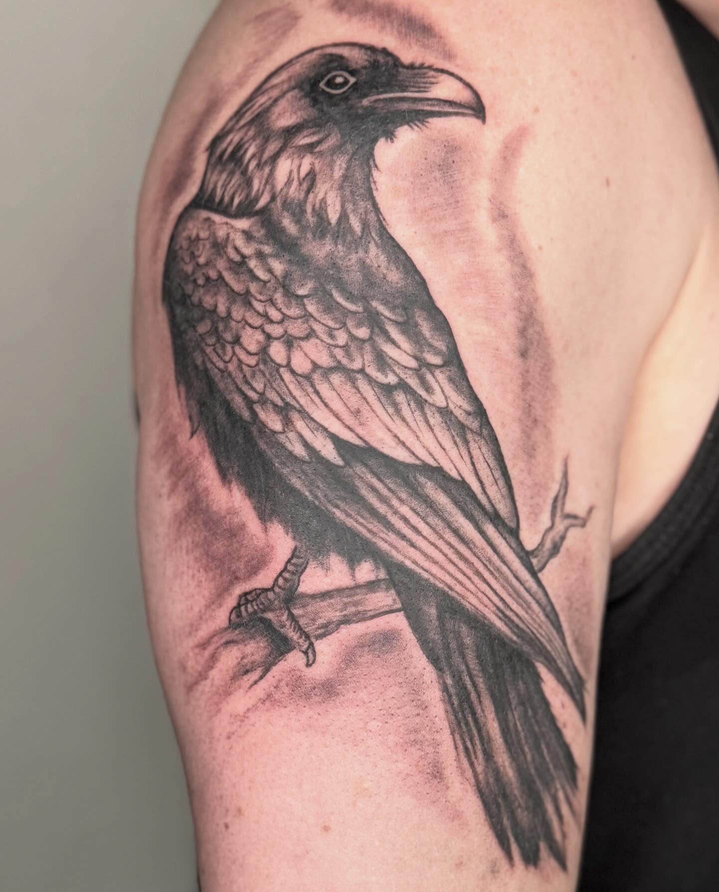 Crow black and grey tattoo on the shoulder by Elmer Lethco