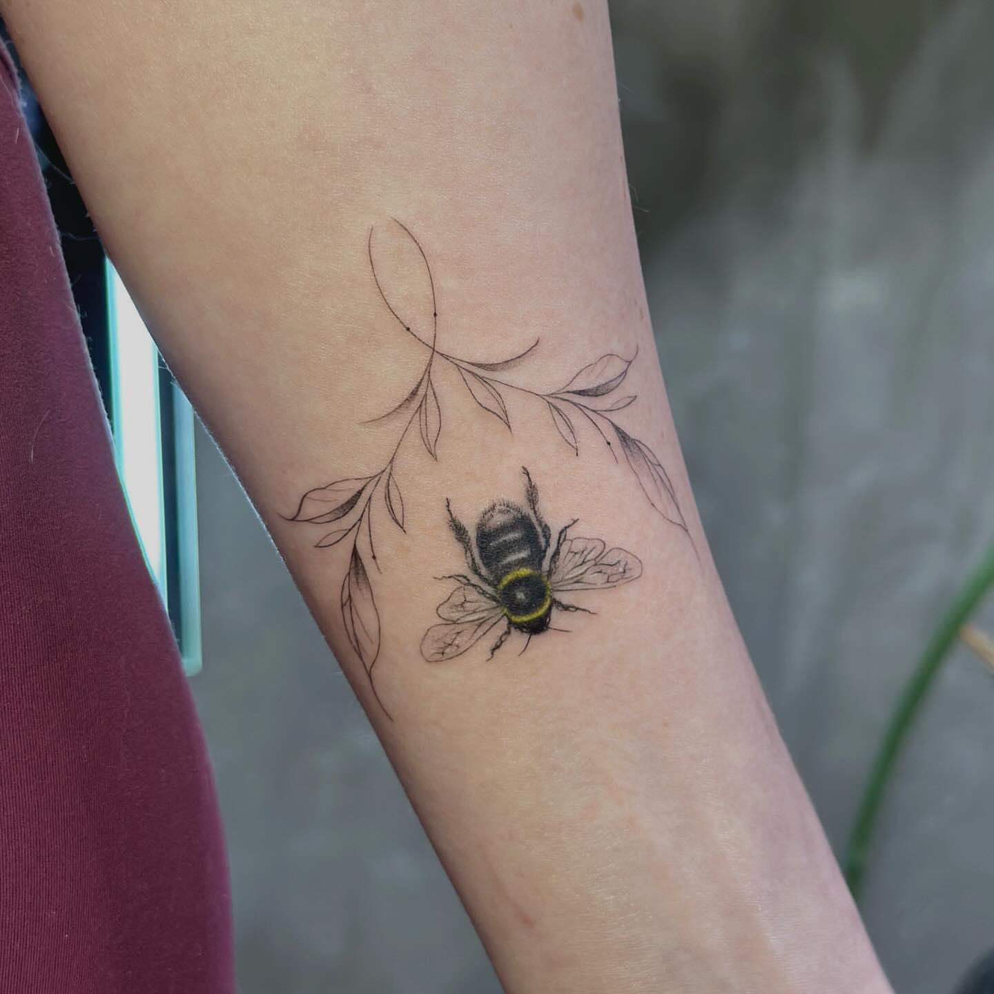 Bee realism tattoo on the forearm by Liv