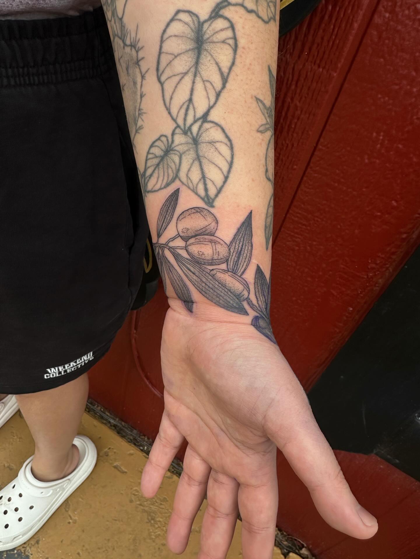 Olive branch black and grey tattoo on the forearm by J Valentin
