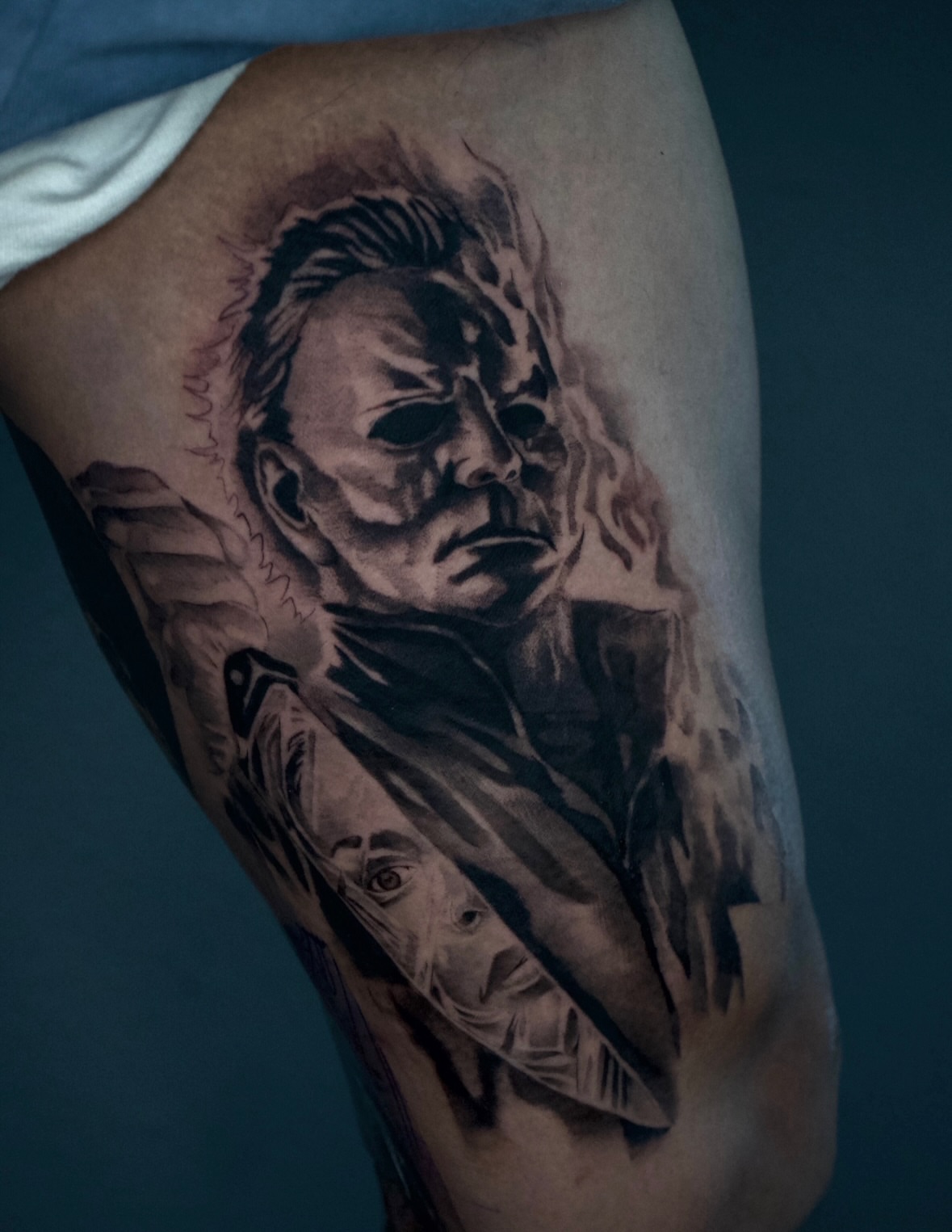 Michael Myers mask realism tattoo on the thigh by R O M y R I N C Ó N